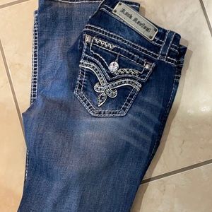 Rock revival Jean boot cut very good condition. Pickets have light blue stones.